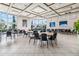 Bright community room with large tables and chairs at 13567 Abberwick Dr, Orlando, FL 32832