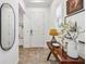 Elegant entryway with console table and decorative accents at 13567 Abberwick Dr, Orlando, FL 32832