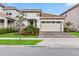 Attractive home with landscaping and a two-car garage at 13567 Abberwick Dr, Orlando, FL 32832