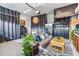 Cozy garage conversion with sitting area, kitchenette, and ample storage at 13567 Abberwick Dr, Orlando, FL 32832
