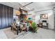 Converted garage with seating area, workspace and a dining table at 13567 Abberwick Dr, Orlando, FL 32832