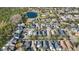 Wide aerial view showing the home's location in a residential neighborhood at 14457 Jamaica Dogwood Dr, Orlando, FL 32828