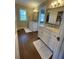 Elegant bathroom with double vanity and granite countertops at 1817 Kalurna Ct, Orlando, FL 32806