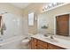Bathroom with a bathtub, toilet, and double vanity at 193 Aurelia Ct, Kissimmee, FL 34758