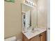 Bathroom with a vanity and mirror at 193 Aurelia Ct, Kissimmee, FL 34758