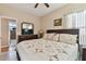 Main bedroom with king-size bed and sitting area at 193 Aurelia Ct, Kissimmee, FL 34758