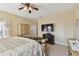 Main bedroom with king-size bed and sitting area at 193 Aurelia Ct, Kissimmee, FL 34758