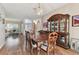 Formal dining room with wooden table and china cabinet at 193 Aurelia Ct, Kissimmee, FL 34758