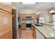 Kitchen boasting stainless steel appliances and granite counters at 193 Aurelia Ct, Kissimmee, FL 34758