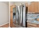 Stainless steel refrigerator in kitchen at 193 Aurelia Ct, Kissimmee, FL 34758