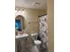 Bathroom with pedestal sink, oval mirror, and shower/tub combo at 2059 Dixie Belle Dr # 2059P, Orlando, FL 32812