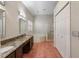 Bathroom boasts granite double vanity, corner tub, and shower at 2061 Petit Ct, Apopka, FL 32712