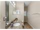Clean bathroom with granite countertop, single sink, and updated fixtures at 2061 Petit Ct, Apopka, FL 32712