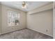 Bedroom with carpet flooring and window with shutters at 2061 Petit Ct, Apopka, FL 32712