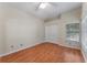 Spacious bedroom with hardwood floors and double door closet at 2061 Petit Ct, Apopka, FL 32712