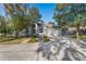 Well maintained house with a spacious driveway and mature trees at 2061 Petit Ct, Apopka, FL 32712