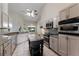 Spacious kitchen with granite counters and stainless steel appliances at 2061 Petit Ct, Apopka, FL 32712