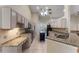 Modern kitchen with granite counters and island at 2061 Petit Ct, Apopka, FL 32712
