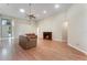 Living room with hardwood floors, a fireplace, and ample natural light at 2061 Petit Ct, Apopka, FL 32712