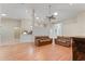 Bright and airy living room with hardwood floors and a fireplace at 2061 Petit Ct, Apopka, FL 32712