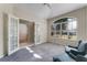 Home office with French doors and gray carpet at 2061 Petit Ct, Apopka, FL 32712