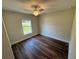 Bedroom with fan and hardwood flooring at 238 Locust Rd, Ocala, FL 34472