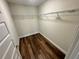 Walk-in closet with wood flooring and wire shelving at 238 Locust Rd, Ocala, FL 34472
