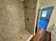 Bathroom shower with gray stone tile at 238 Locust Rd, Ocala, FL 34472