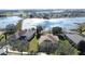 Houses near lake with lush greenery at 250 Bayou Bend Rd, Groveland, FL 34736