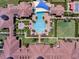 Aerial view of community pool and surrounding amenities at 250 Bayou Bend Rd, Groveland, FL 34736