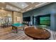 Game room featuring a pool table and golf simulator at 250 Bayou Bend Rd, Groveland, FL 34736