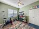 Exercise room with stationary bike and other fitness equipment at 250 Bayou Bend Rd, Groveland, FL 34736