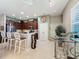 Spacious kitchen with stainless steel appliances and an island at 250 Bayou Bend Rd, Groveland, FL 34736