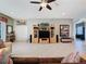 Bright living room features a built-in entertainment center and tile floors at 250 Bayou Bend Rd, Groveland, FL 34736