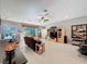 Bright living room with hardwood floors and built-in entertainment center at 250 Bayou Bend Rd, Groveland, FL 34736