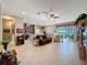 Open living room with view of the lake at 250 Bayou Bend Rd, Groveland, FL 34736