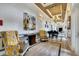 Elegant lobby with comfortable seating, a grand piano, and tasteful artwork at 250 Bayou Bend Rd, Groveland, FL 34736