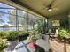 Relaxing screened patio with lake view at 250 Bayou Bend Rd, Groveland, FL 34736