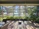Spacious screened patio overlooking lake at 250 Bayou Bend Rd, Groveland, FL 34736