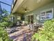 Outdoor patio with seating and plants at 250 Bayou Bend Rd, Groveland, FL 34736