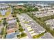 Aerial view of townhome community near a lake at 2511 Formax Dr, Orlando, FL 32828