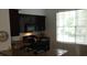 Cozy kitchen with dark wood cabinets, granite counters, and appliances at 2558 Robert Trent Jones Dr # 1427, Orlando, FL 32835