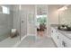 Modern bathroom with double vanity and large walk-in shower at 2987 Arranmore Dr, Ormond Beach, FL 32174