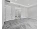 Spacious main bedroom featuring plush carpeting and an en-suite bathroom with a glass-enclosed shower at 2987 Arranmore Dr, Ormond Beach, FL 32174