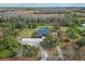 Aerial view showcasing a home with a pool and expansive property at 3401 Abalone Blvd, Orlando, FL 32833