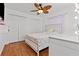 Bright bedroom with fan, wardrobe, and decorative vanity at 3401 Abalone Blvd, Orlando, FL 32833