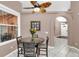 Charming dining area with natural light, a round table, and easy access to the entryway at 3401 Abalone Blvd, Orlando, FL 32833