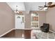 Cozy living room featuring hardwood floors and large windows at 3401 Abalone Blvd, Orlando, FL 32833