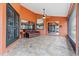 Enclosed patio featuring a tile floor and a comfortable seating area at 3401 Abalone Blvd, Orlando, FL 32833