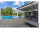 Relaxing pool area with pergola, seating, and large pool at 3401 Abalone Blvd, Orlando, FL 32833